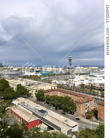 Barcelona Port and cable car station overlooking from Montjuïc hill 97889945