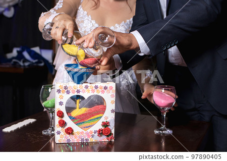 Sand ceremony at a wedding party. Wedding day 97890405