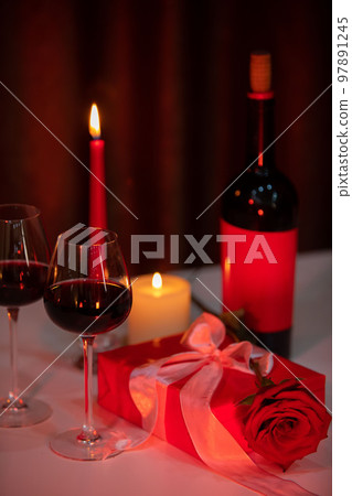 romantic date concept red wine with glasses and candles romantic date concept red wine with glasses and candles 97891245