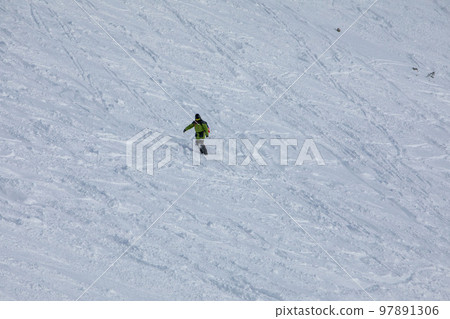 snowboarder at free ride slope 97891306