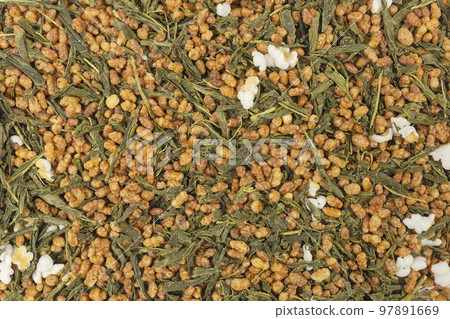 Green tea Japanese Genmaicha background. Green tea mixed with roasted popped brown rice filling the frame. 97891669