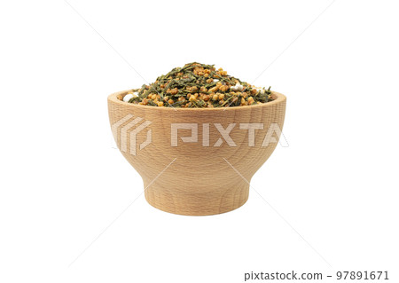 Green tea Japanese Genmaicha. Green tea mixed with roasted popped brown rice in wooden bowl isolated on white background. 97891671