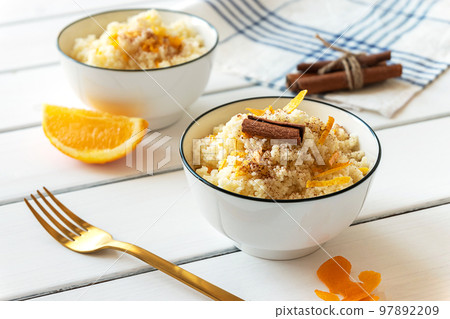 Delicious homemade couscous with oranges and cinnamon Delicious homemade couscous with oranges and cinnamon 97892209
