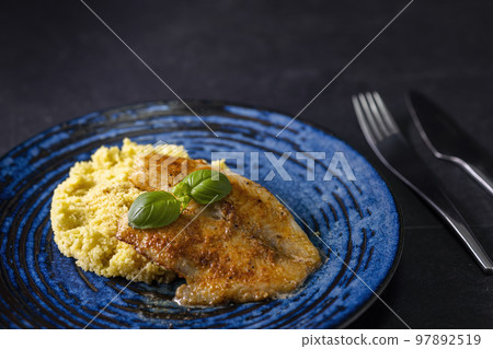 spicy fillet of white cod with couscous spicy fillet of white cod with couscous 97892519