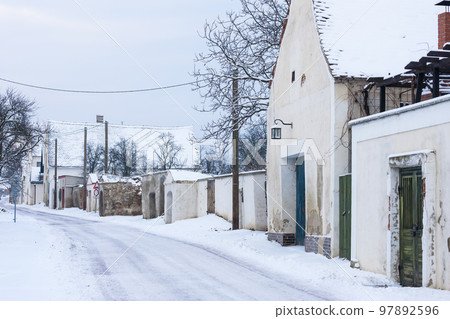 wine cellars in winter, Satov, Czech Republic 97892596