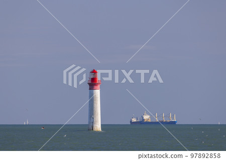 Phare de Chauvea near Ile de Re with ships to La Rochelle, Pays de la Loire, France Phare de Chauvea near Ile de Re with ships to La Rochelle, Pays de la Loire, France 97892858