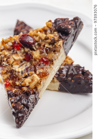 cookies with candies, nuts and chocolate cookies with candies, nuts and chocolate 97893076