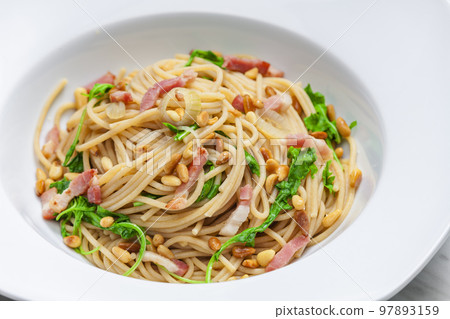 spaghetti with spinach, bacon and kernels spaghetti with spinach, bacon and kernels 97893159