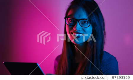Young and pretty Asian - portrait shot in RGB colors Young and pretty Asian - portrait shot in RGB colors 97893599