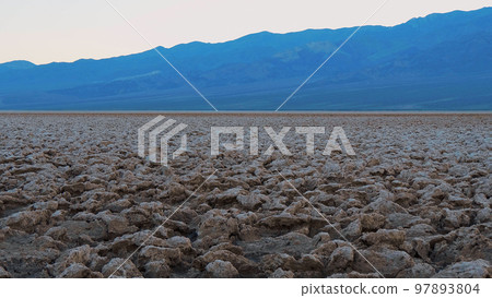 The crusty landscape of Devils Golf Course at Death Valley National Park The crusty landscape of Devils Golf Course at Death Valley National Park 97893804