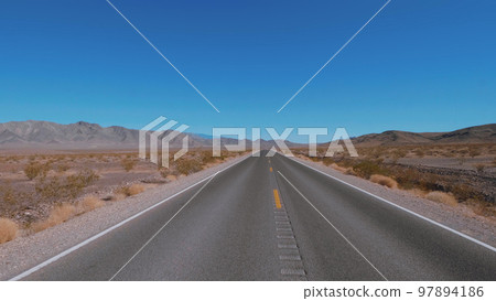 Empty street in the desert of Nevada 97894186