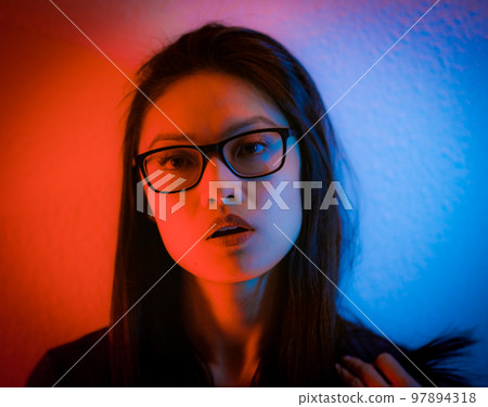 Young and pretty Asian - portrait shot in RGB colors 97894318