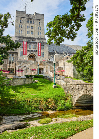 Bridge over creek leads to college campus bookstore in Indiana Bridge over creek leads to college campus bookstore in Indiana 97895179