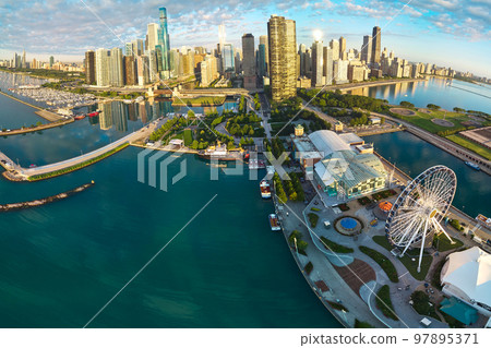 Aerial warped panorama of Navy Pier and Chicago skyline during sunrise Aerial warped panorama of Navy Pier and Chicago skyline during sunrise 97895371