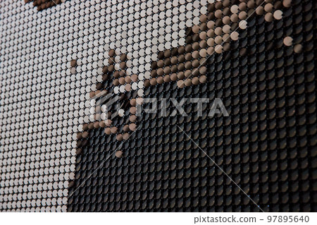 Abstract wall of white and black flipping panels blurred in transition 97895640