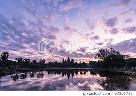 Sunrise at Angkor Wat in Cambodia's tourist city Siem Reap Sunrise at Angkor Wat in Cambodia's tourist city Siem Reap 97895785