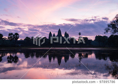 Sunrise at Angkor Wat in Cambodia's tourist city Siem Reap Sunrise at Angkor Wat in Cambodia's tourist city Siem Reap 97895786