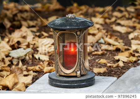 memorial lantern with burning candle memorial lantern with burning candle 97896245