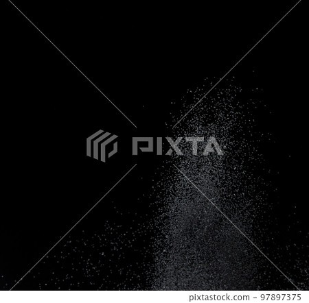 Million of black sand explosion, Photo image of falling down sands flying. Freeze shot on black background isolated overlay. Tiny Fine sand dust magnet as particle disintegrate science 97897375