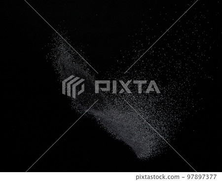 Million of black sand explosion, Photo image of falling down sands flying. Freeze shot on black background isolated overlay. Tiny Fine sand dust magnet as particle disintegrate science 97897377