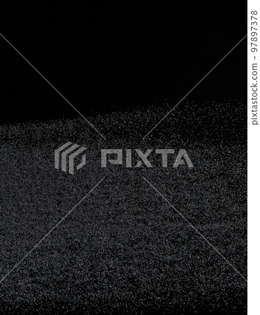 Million of black sand explosion, Photo image of falling down sands flying. Freeze shot on black background isolated overlay. Tiny Fine sand dust magnet as particle disintegrate science Million of black sand explosion, Photo image of falling down sands flying. Freeze shot on black background isolated overlay. Tiny Fine sand dust magnet as particle disintegrate science 97897378