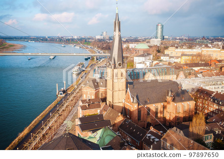 skyline of Dusseldorf with church view near canal. 97897650