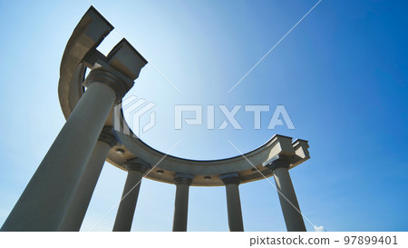 White rotundas in the city near the waterfront. White rotundas in the city near the waterfront. 97899401