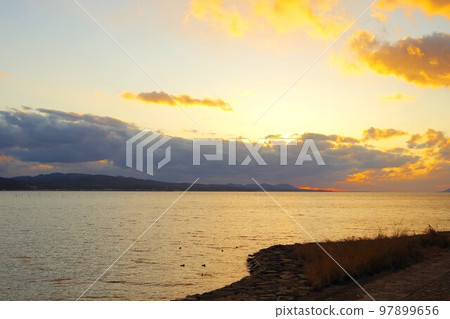 Evening landscape of the lake 97899656