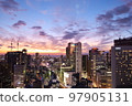 Glittering city lights from dusk 97905131