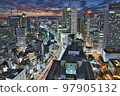 Glittering city lights from dusk 97905132