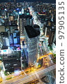 Glittering city lights from dusk 97905135