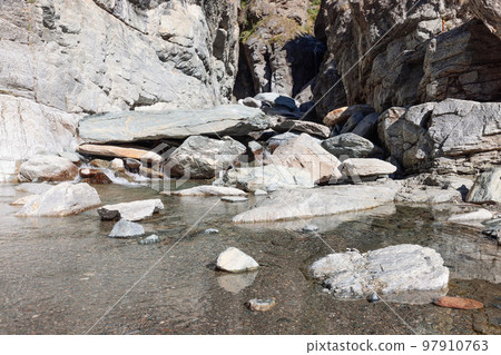 Lillaz waterfall (Cascate di Lillaz) in granite crack, close view, Aosta valley, Italy 97910763