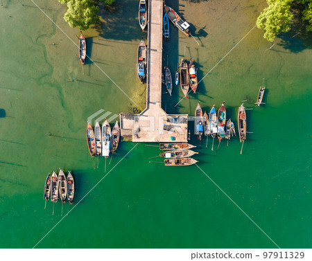 Aerial view of Bo Chet Luk port Harbour with long tail boats, in Satun Geopark, Thailand 97911329