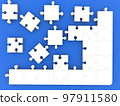 Unfinished white puzzle on a blue background 97911580