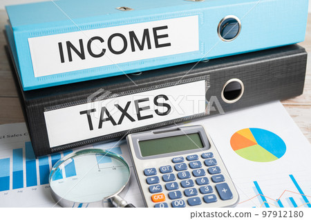 Income, Taxs. Binder data finance report business with graph analysis in office. 97912180