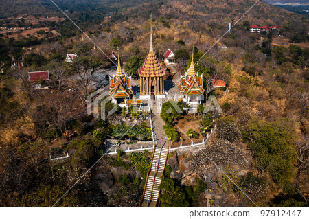 Aerial view of Wat Khao Phra Si Sanphet, temple on top of the hill, in Suphan Buri, Thailand 97912447
