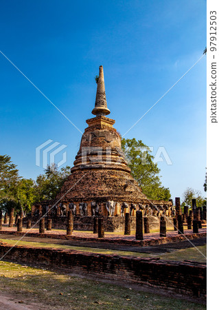 Wat Chang Lom elephant temple in Sukhothai historical park, Thailand 97912503