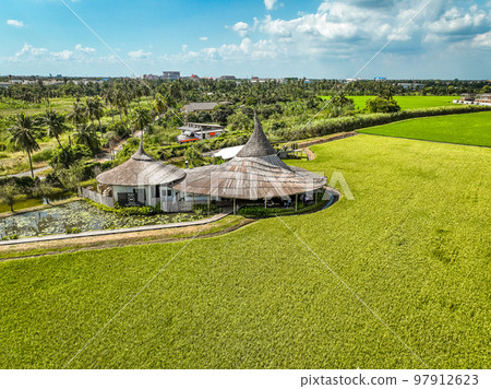 Aerial view of thai restaurant in rice fields in Nakhon Pathom, Thailand Aerial view of thai restaurant in rice fields in Nakhon Pathom, Thailand 97912623