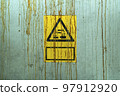 Chemical warnings sign on a wall Chemical warnings sign on a wall 97912920