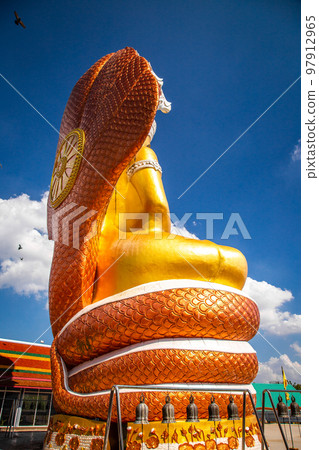 Giant Buddhawith Naga serpent temple in Singburi, Thailand Giant Buddhawith Naga serpent temple in Singburi, Thailand 97912965