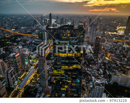 Aerial view of King Power Mahanakhon tower in Sathorn Silom central business district of Bangkok Aerial view of King Power Mahanakhon tower in Sathorn Silom central business district of Bangkok 97913228