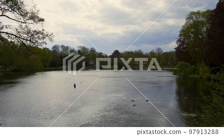 Pond Muehlenteich in the city of Lubeck Germany Pond Muehlenteich in the city of Lubeck Germany 97913288