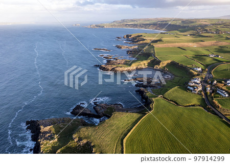 Aerial view of Dunseverick in County Antrim, in Northern Ireland. Aerial view of Dunseverick in County Antrim, in Northern Ireland. 97914299