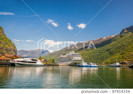 Port of Flam against fjord with cruise ship in Norway Port of Flam against fjord with cruise ship in Norway 97914339