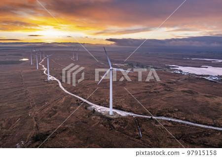 Amazing sunrise at the Loughderryduff windfarm between Ardara and Portnoo in County Donegal, Ireland 97915158