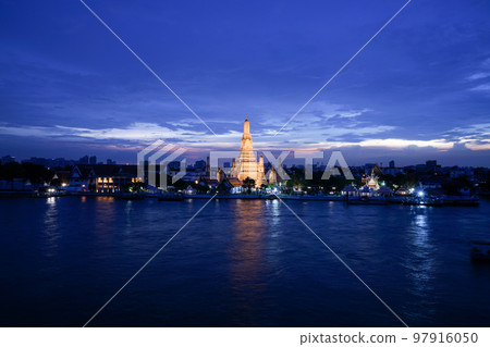 Night view of the Chao Phraya River and Wat Arun (Temple of Dawn), a tourist attraction in Bangkok, Thailand Night view of the Chao Phraya River and Wat Arun (Temple of Dawn), a tourist attraction in Bangkok, Thailand 97916050