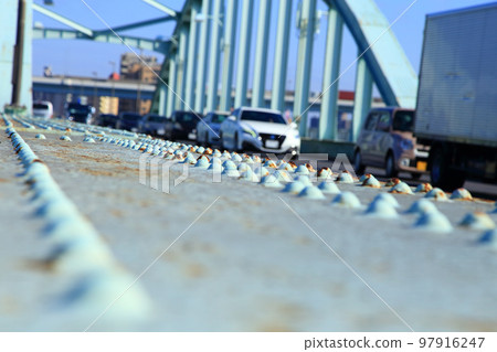 Cars running on Yotsugi Bridge 97916247