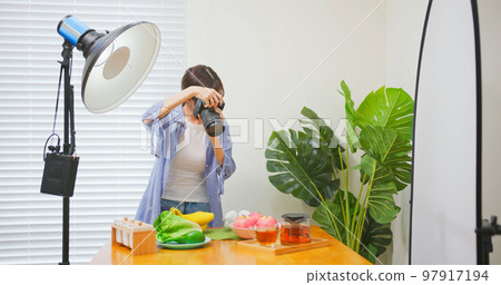 Photographer taking picture 97917194