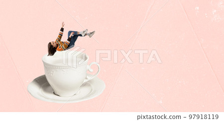 Contemporary art collage. Creative design. Young woman in cozy sweater falling into cup with hot milk over pink background Contemporary art collage. Creative design. Young woman in cozy sweater falling into cup with hot milk over pink background 97918119
