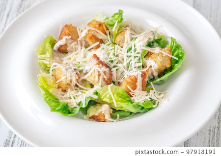 Portion of Caesar salad 97918191